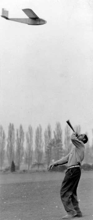 Jim Walker blows a note to turn his Sonic Glider